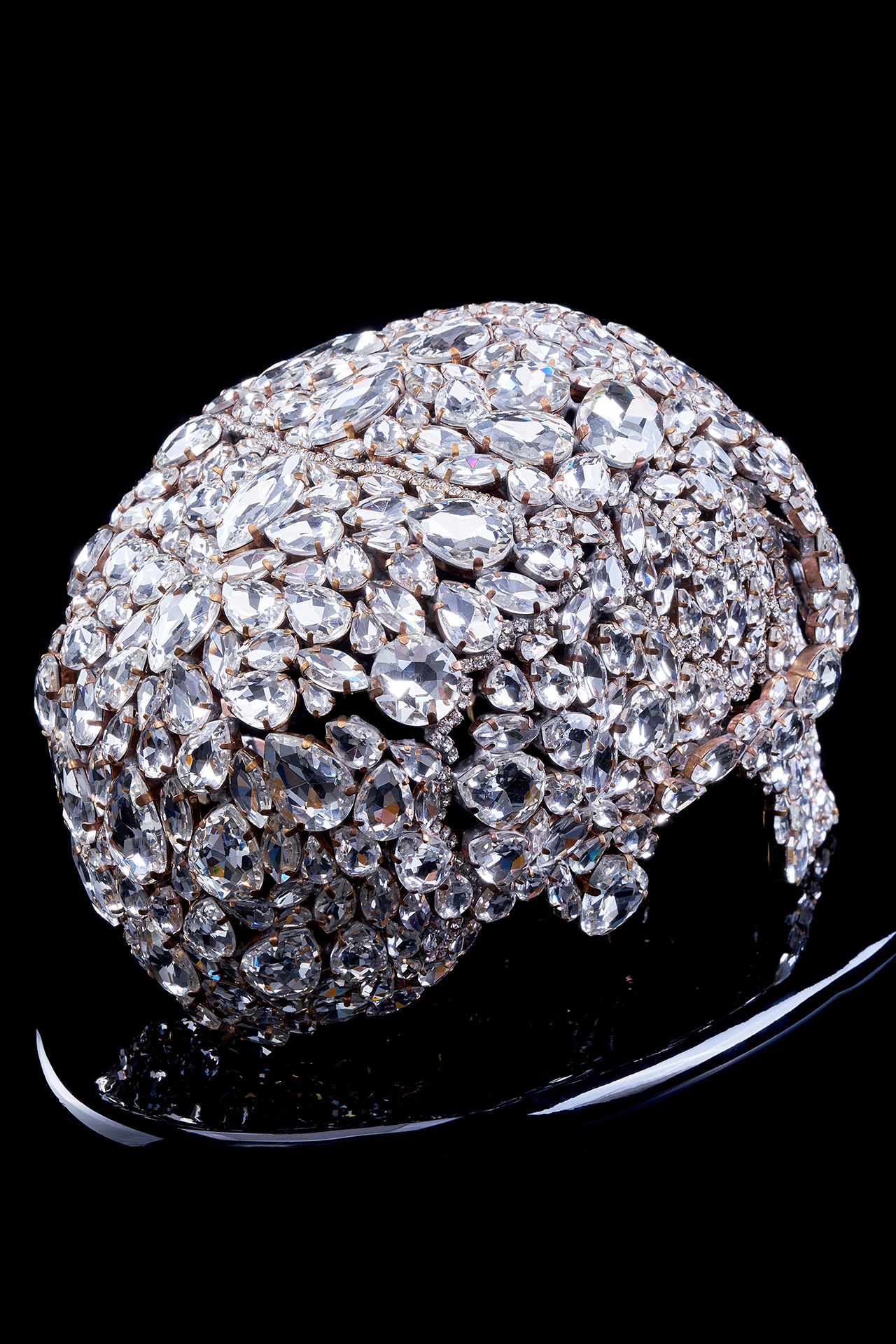 Captivating rhinestone skull with glitter decor
