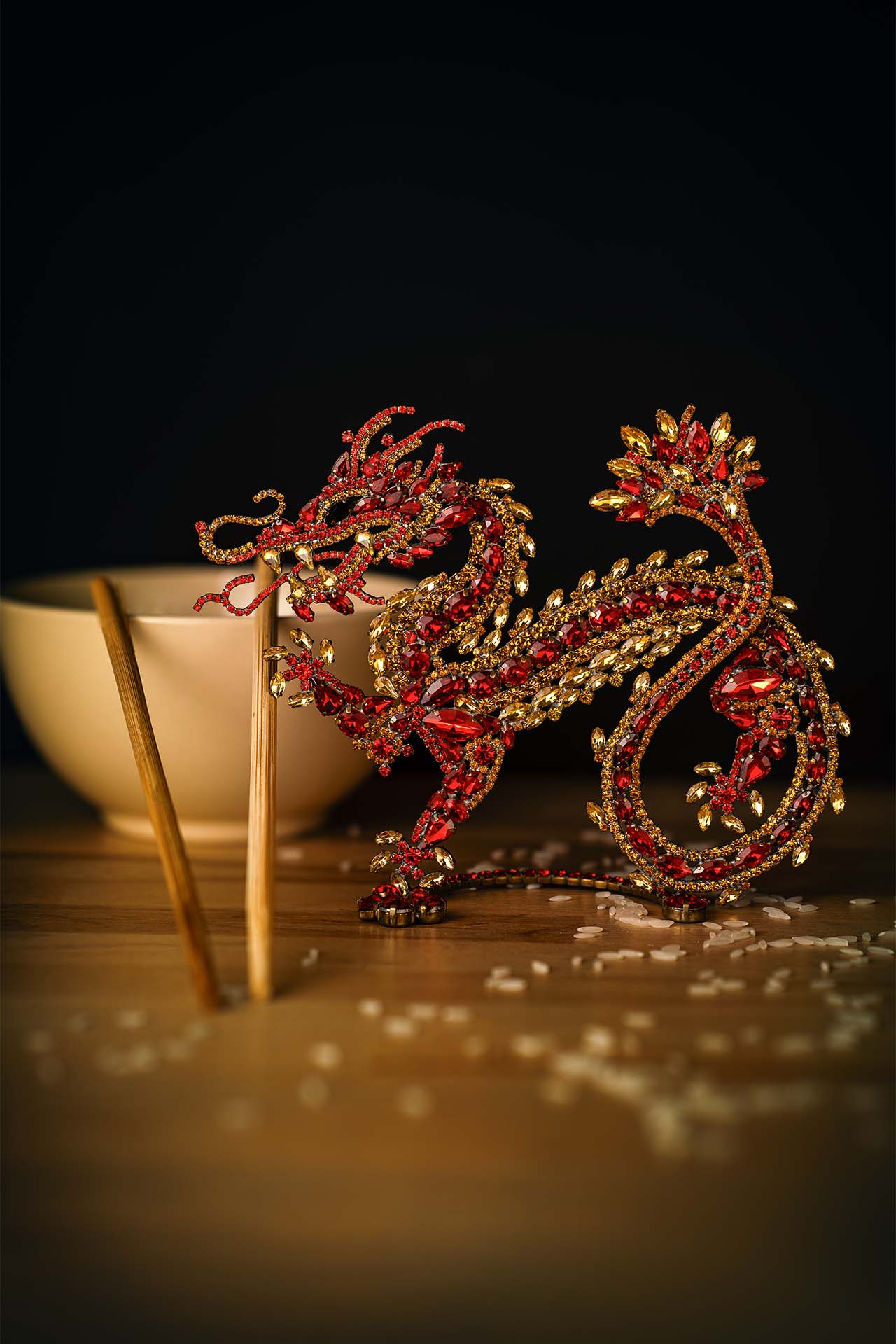 The Chinese dragon decoration from red and gold  rhinestones