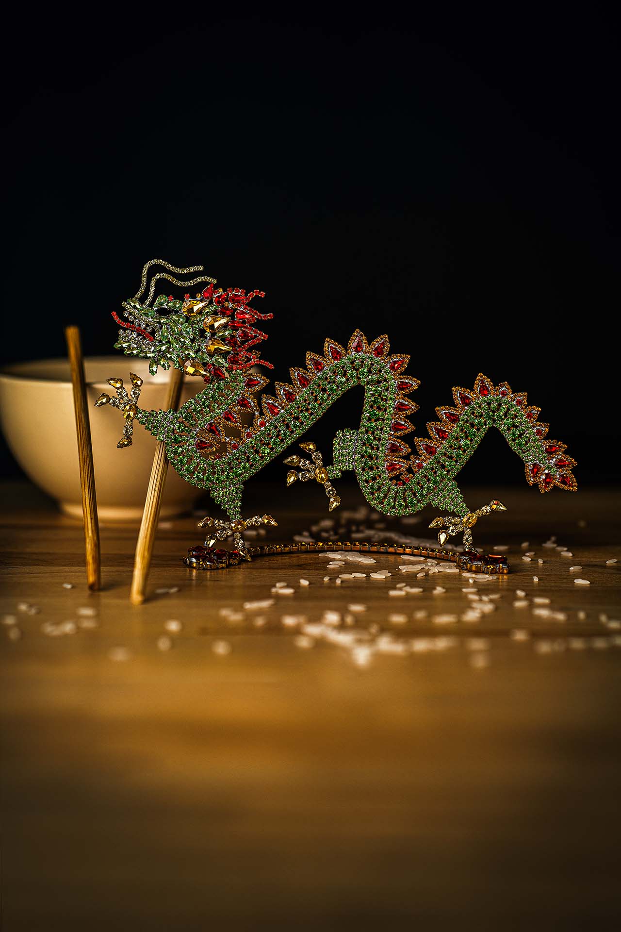 A beautiful Chinese dragon made of rhinestones in red and green