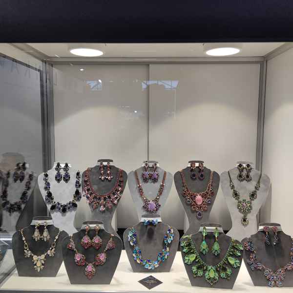 A close-up view of exquisite rhinestone necklaces showcased at the Inhorgenta exhibition.