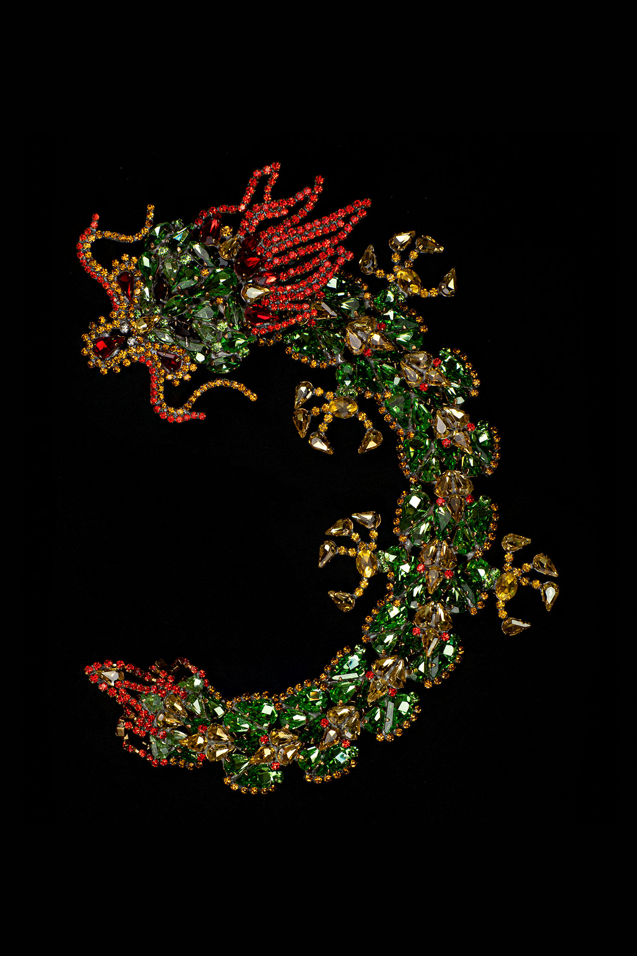 Handmade rhinestone brooch with a green Chinese dragon