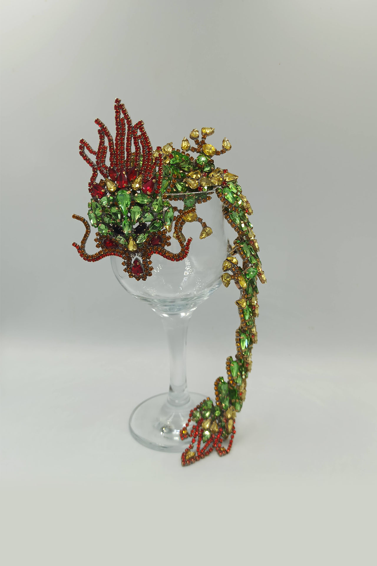Handmade rhinestone brooch with a green Chinese dragon