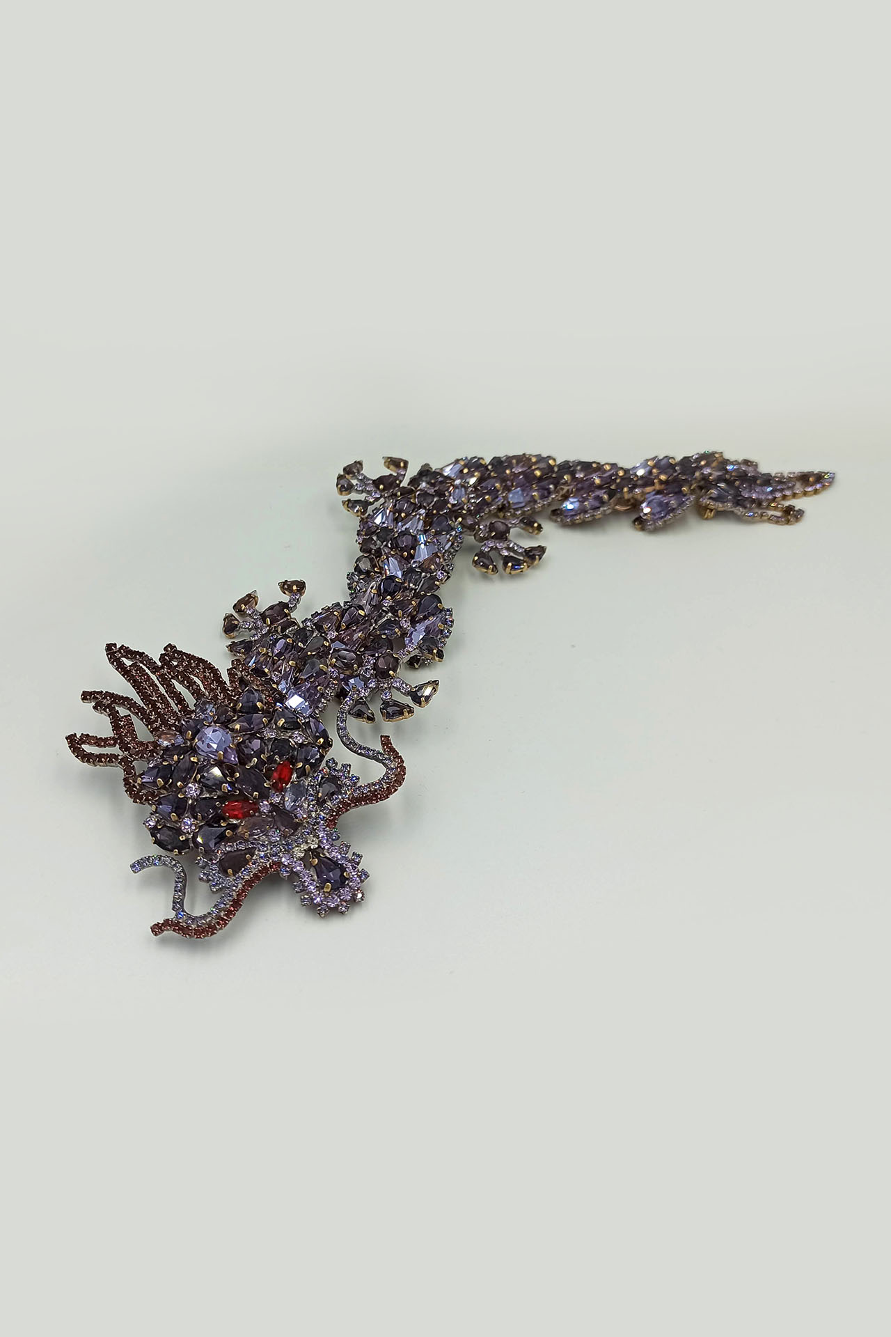Handmade rhinestone brooch with a purple Chinese dragon
