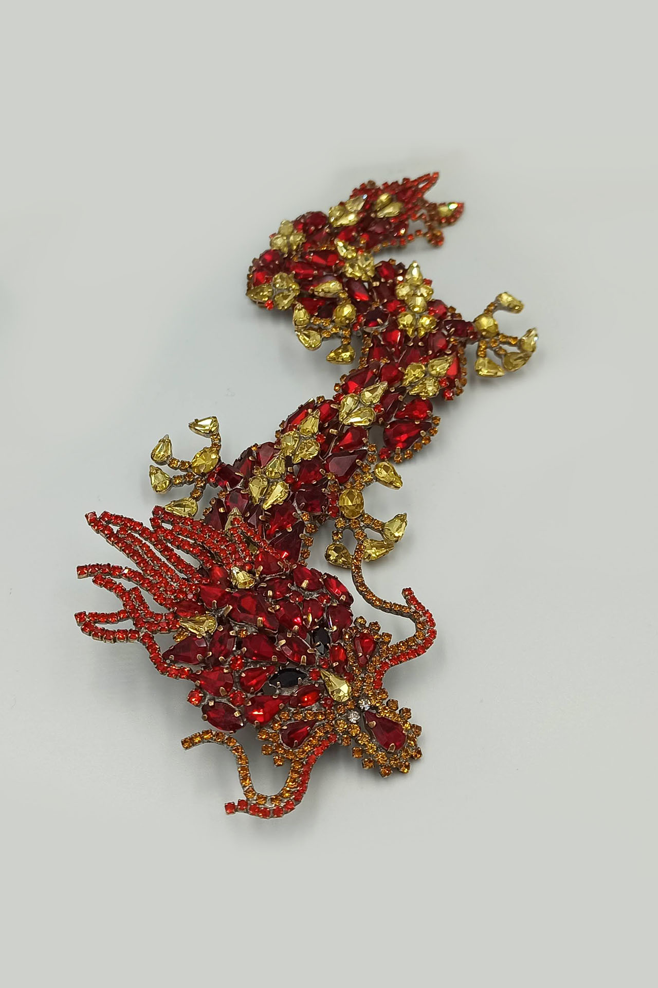 Handmade rhinestone brooch with a red Chinese dragon