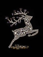 prancing reindeer purple facing right