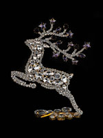 prancing reindeer purple facing left