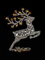 prancing reindeer yellow facing right