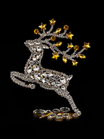 prancing reindeer yellow facing left