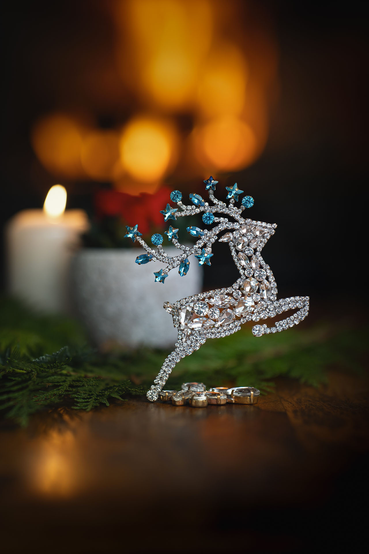 Rhinestone reindeer figurine with yellow rhinestones - facing right