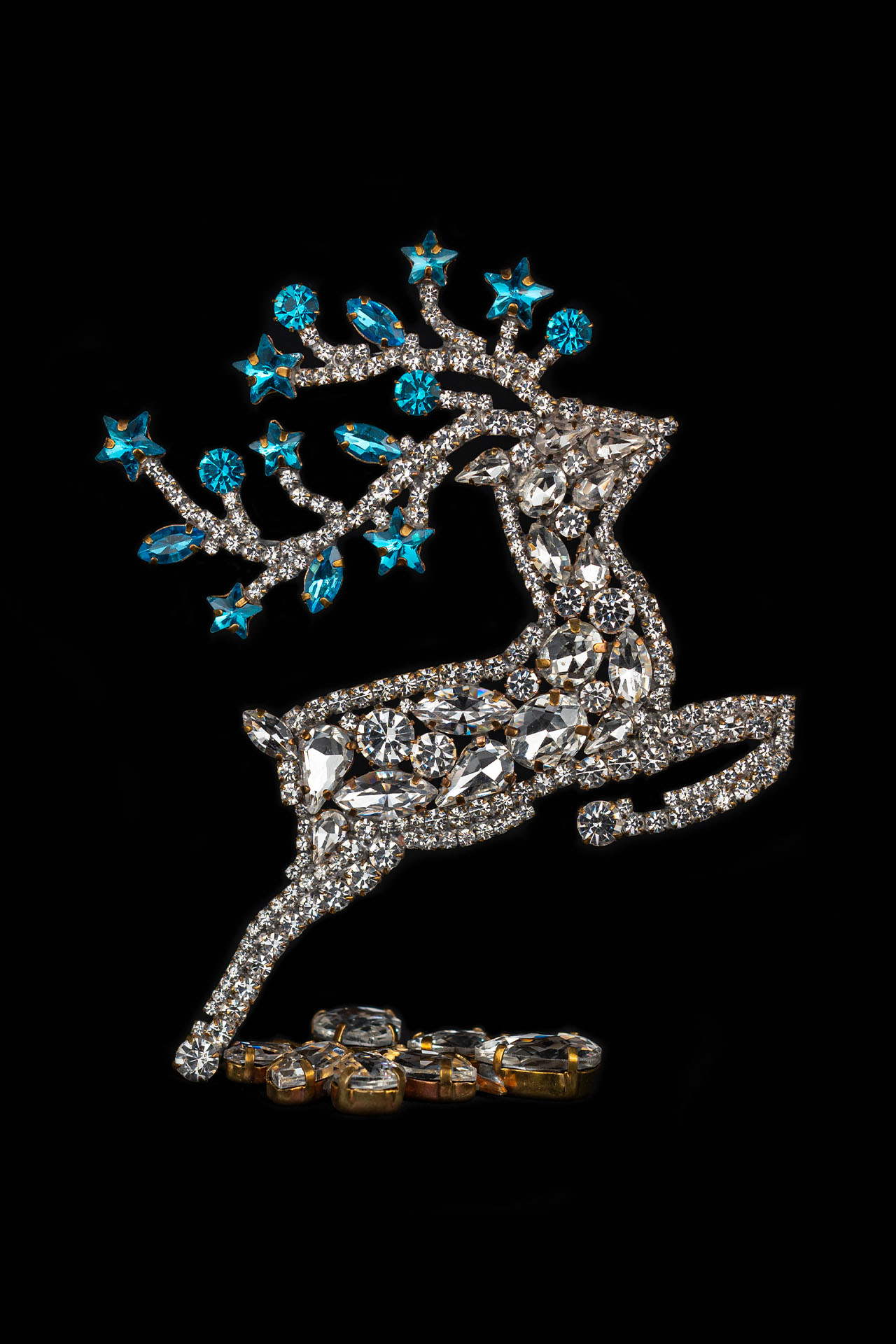 Rhinestone reindeer figurine with yellow rhinestones - facing right