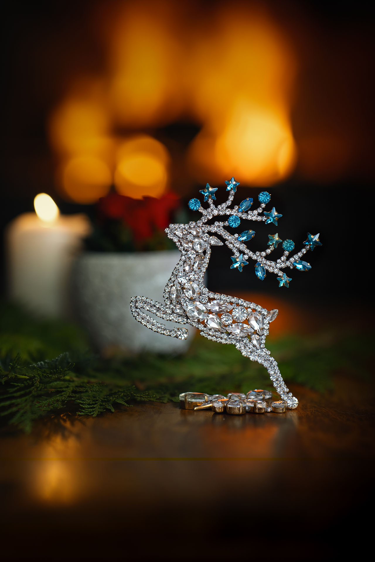 Rhinestone reindeer figurine with yellow rhinestones - facing left