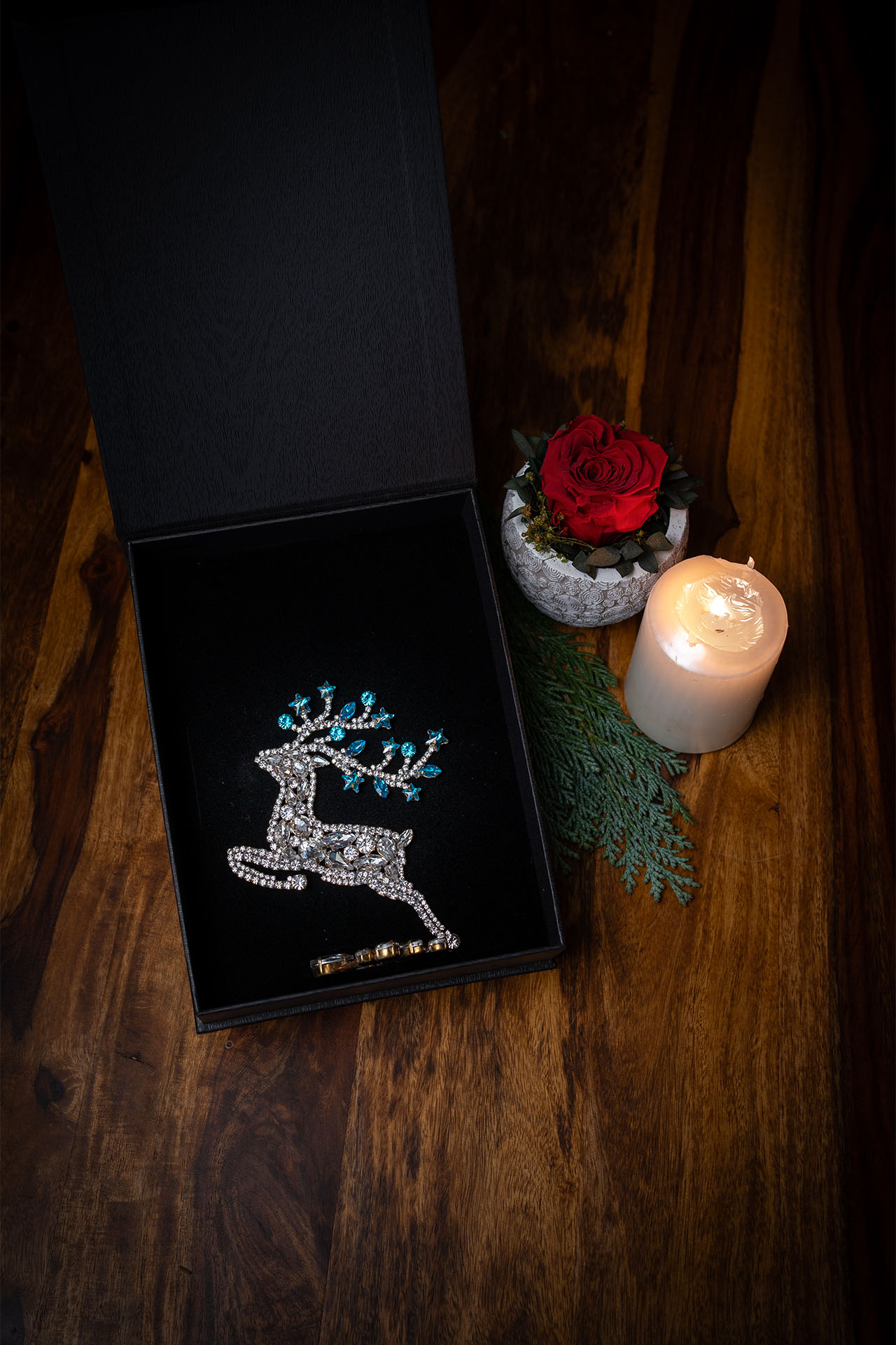 Rhinestone reindeer figurine with yellow rhinestones - facing left