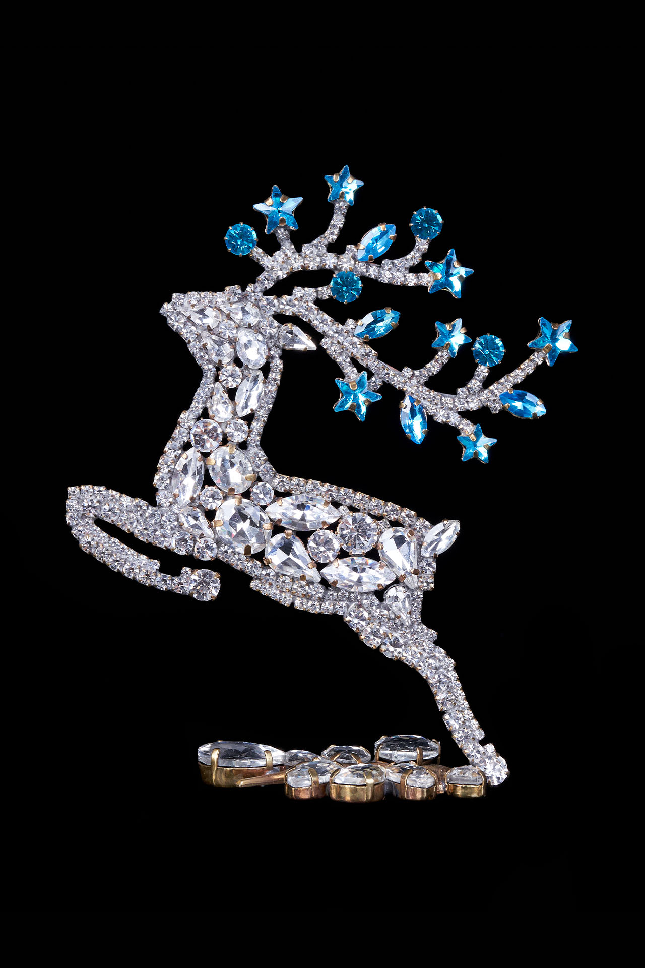 Rhinestone reindeer figurine with yellow rhinestones - facing left