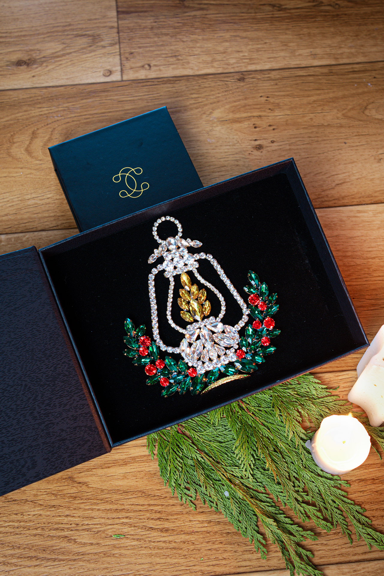 Medium light up Christmas lantern with an evergreen base