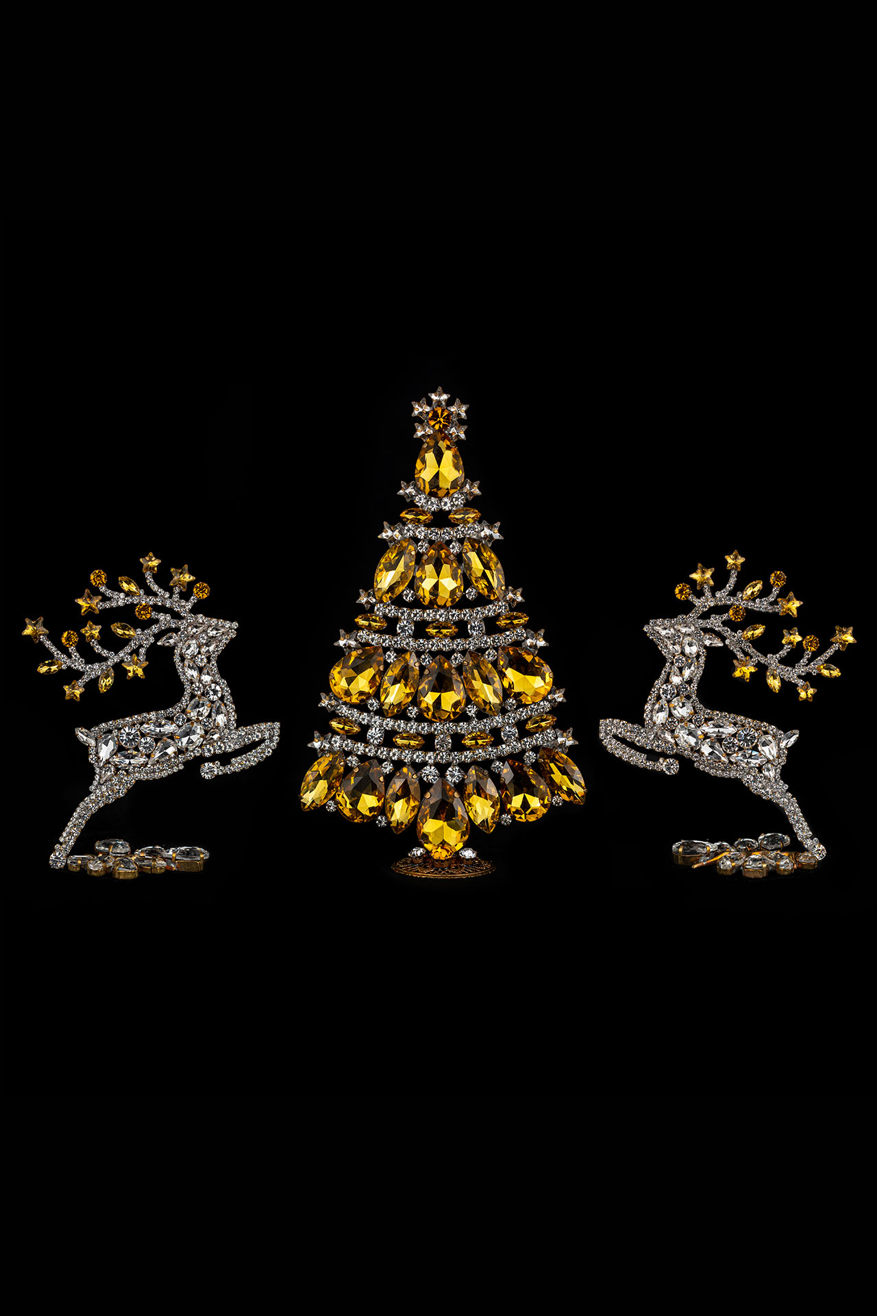 Christmas tree and reindeers from clear and yellow rhinestones