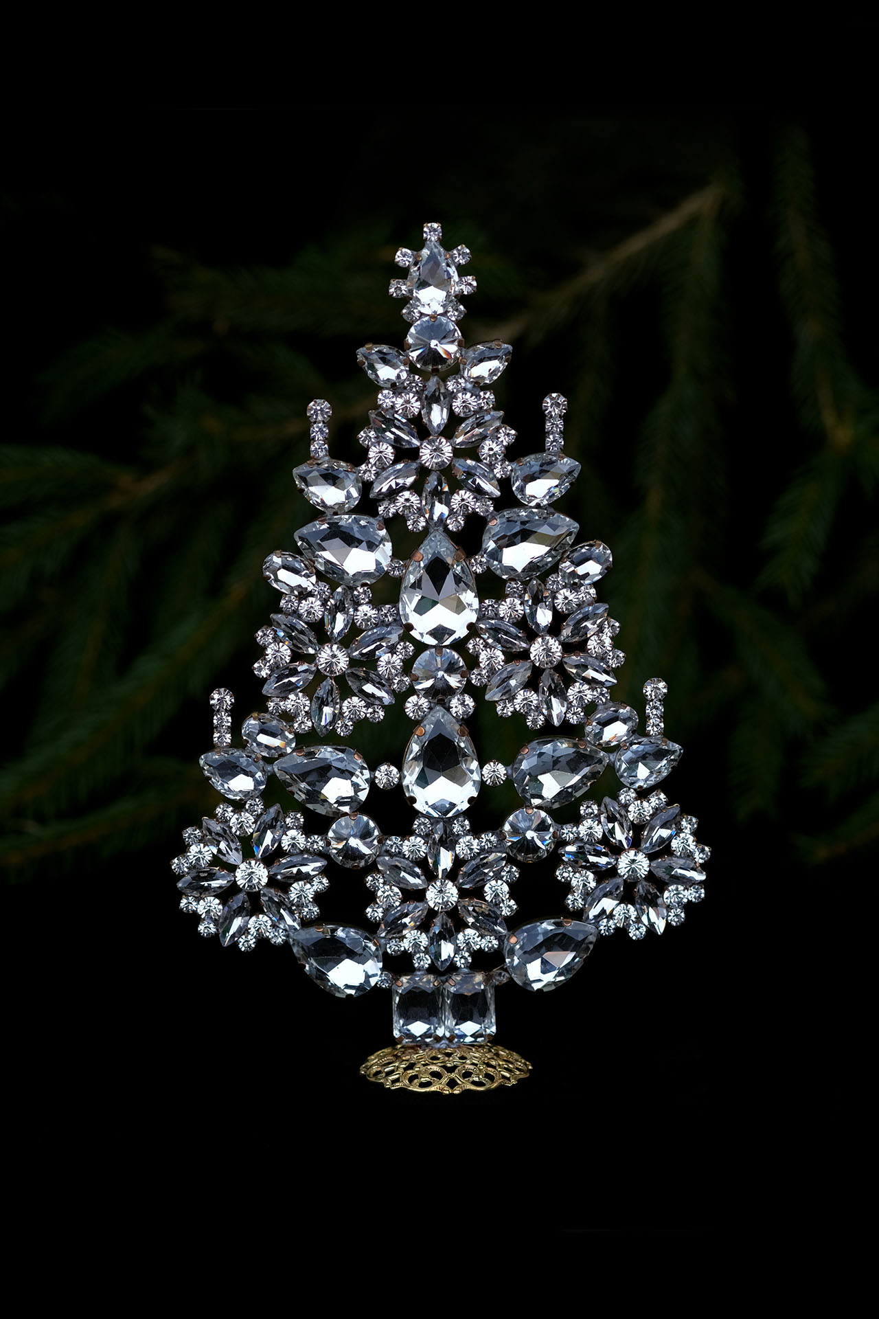 Handcrafted Christmas tree decorated with clear crystals