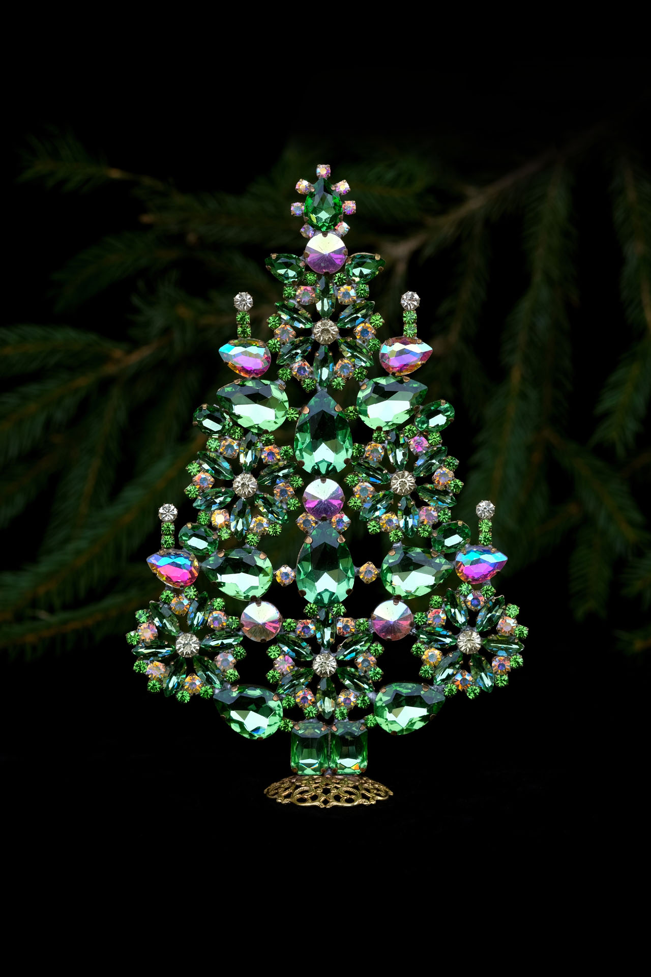 Amazing handcrafted Christmas tree with ornaments in green crystals