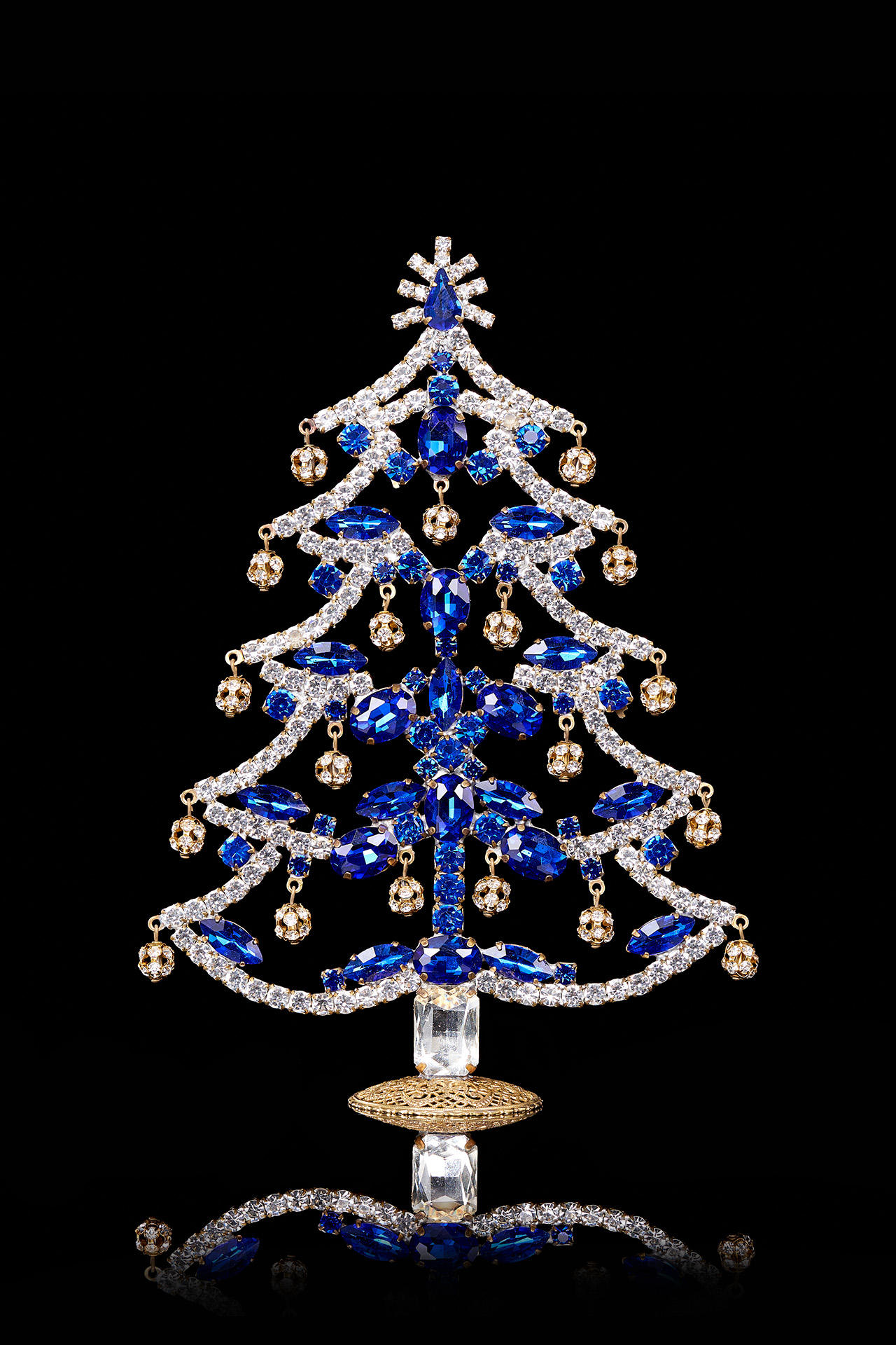 Crystalline Christmas tree decorated from blue rhinestones