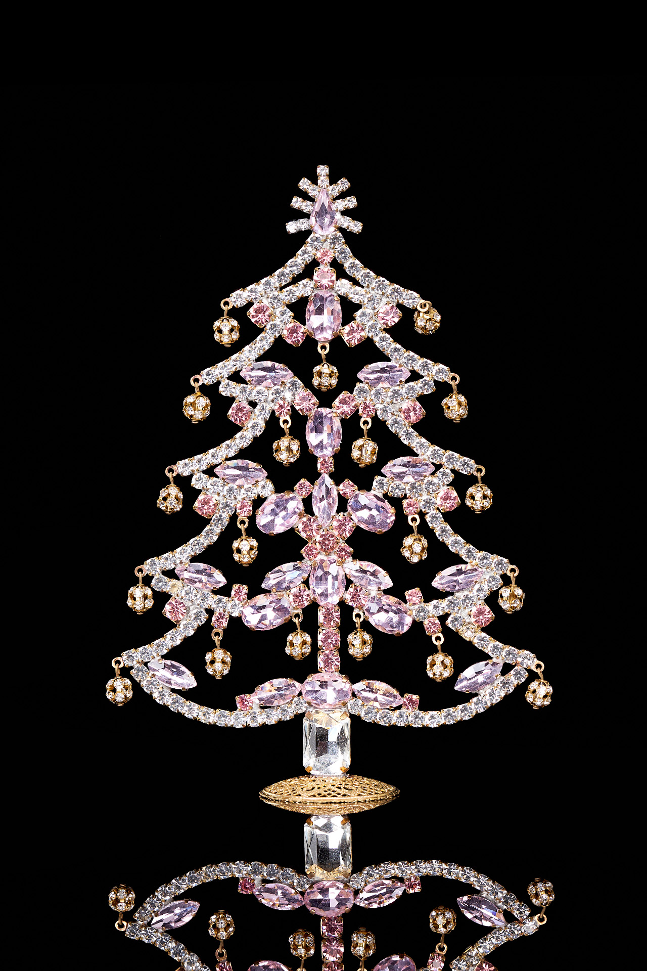 Crystalline Christmas tree decorated from pink rhinestones