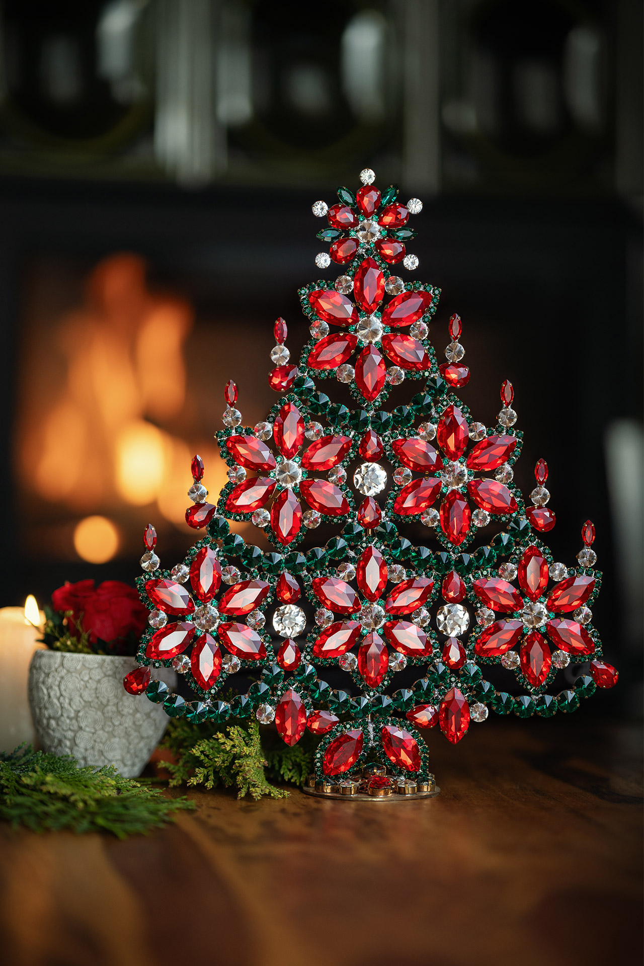 Handmade red and green Christmas tree with snowflakes and candles