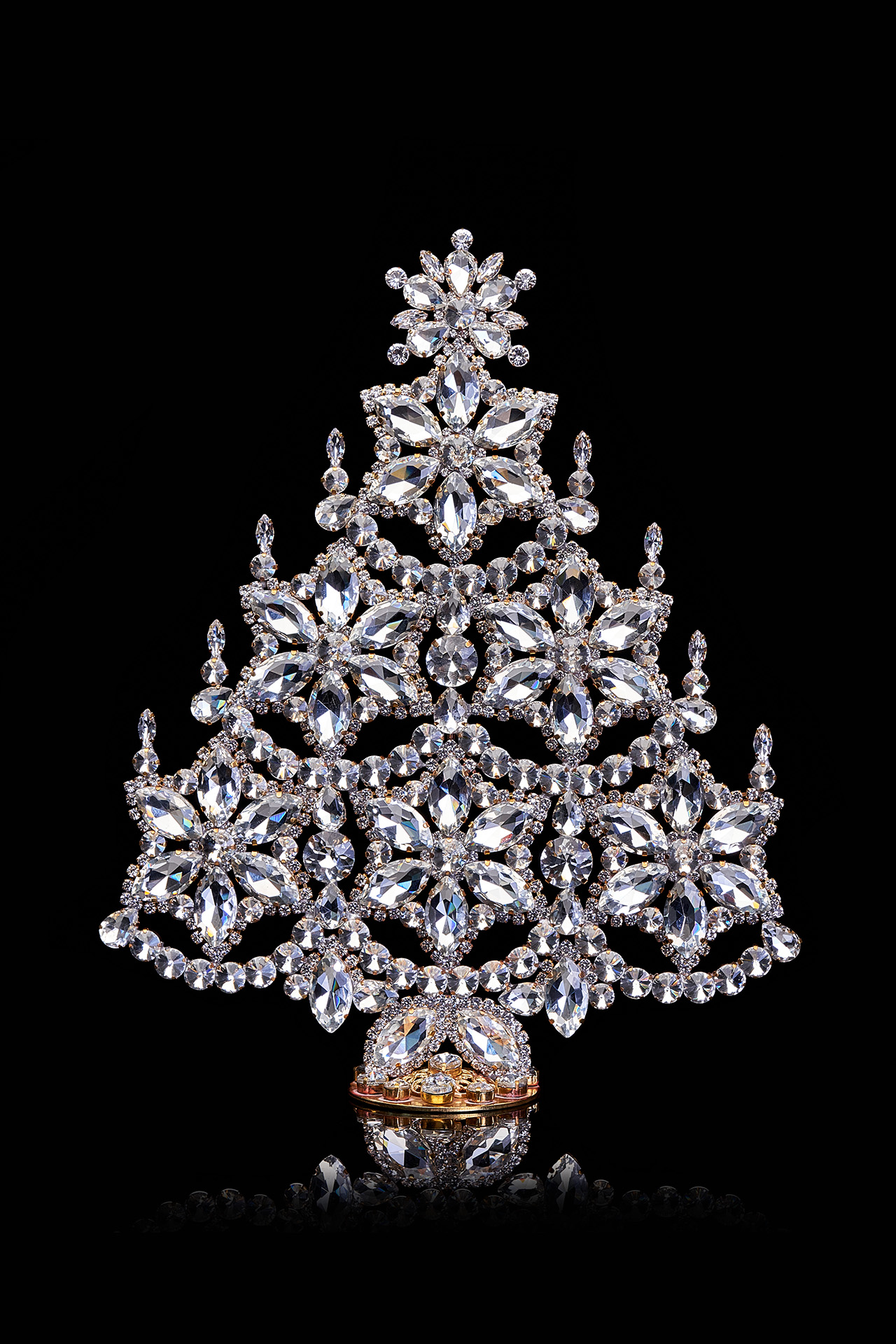 Handcrafted crystal Christmas tree with snowflakes and candles