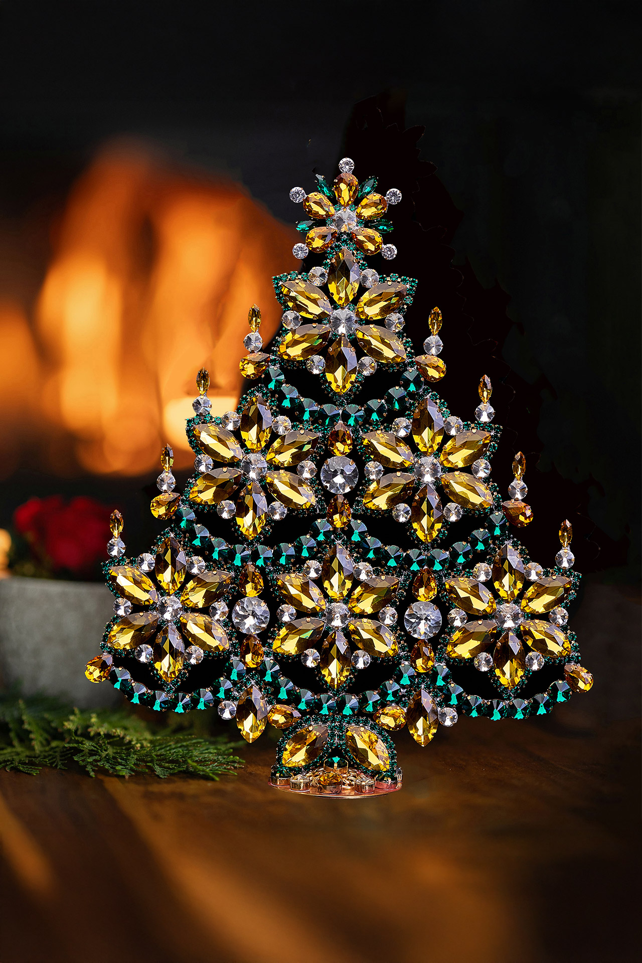 Handmade gold and green Christmas tree with snowflakes and candles