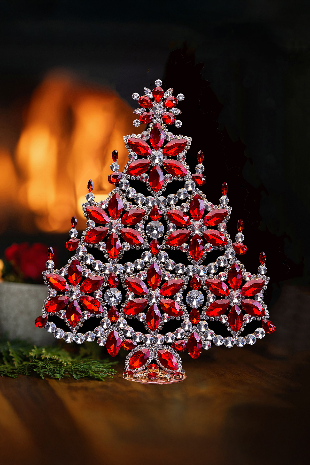 Handmade red and clear Christmas tree with snowflakes and candles