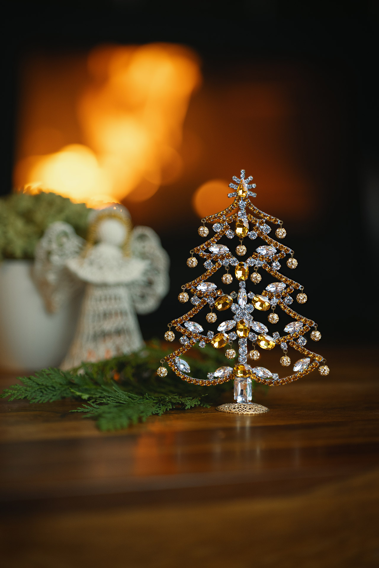 Crystalline Christmas tree decorated from yellow rhinestones