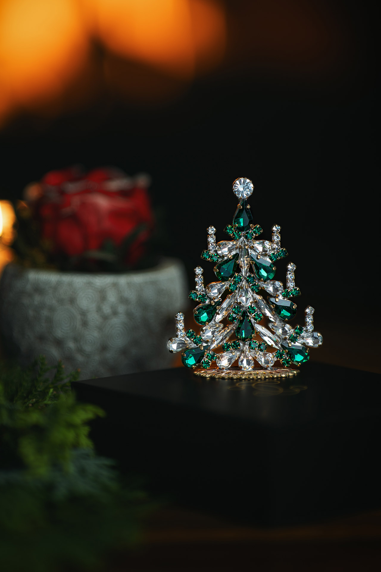 Handcrafted festive Christmas tree with green rhinestones