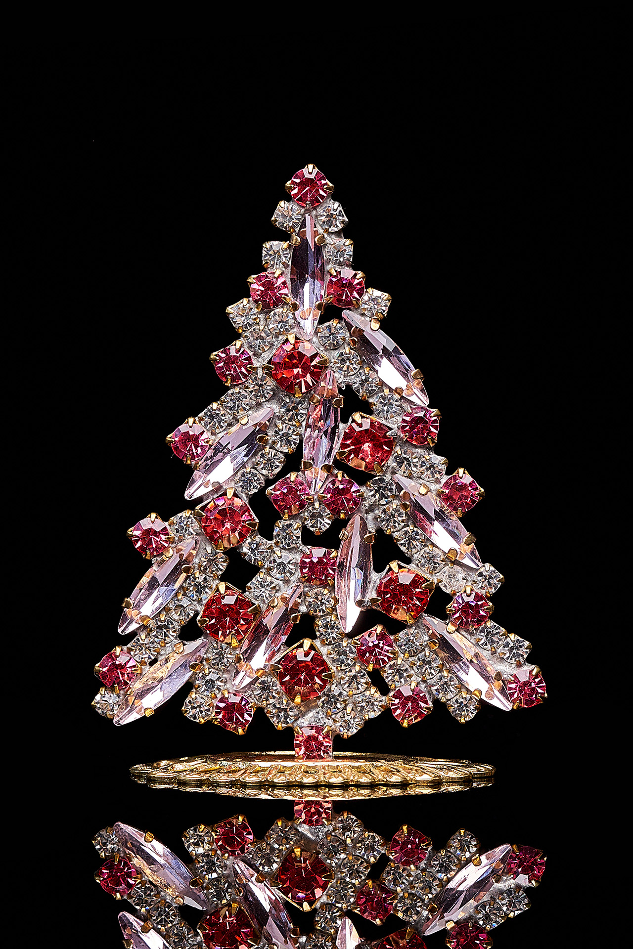 Magical tabletop Christmas tree handcrafted with pink rhinestones