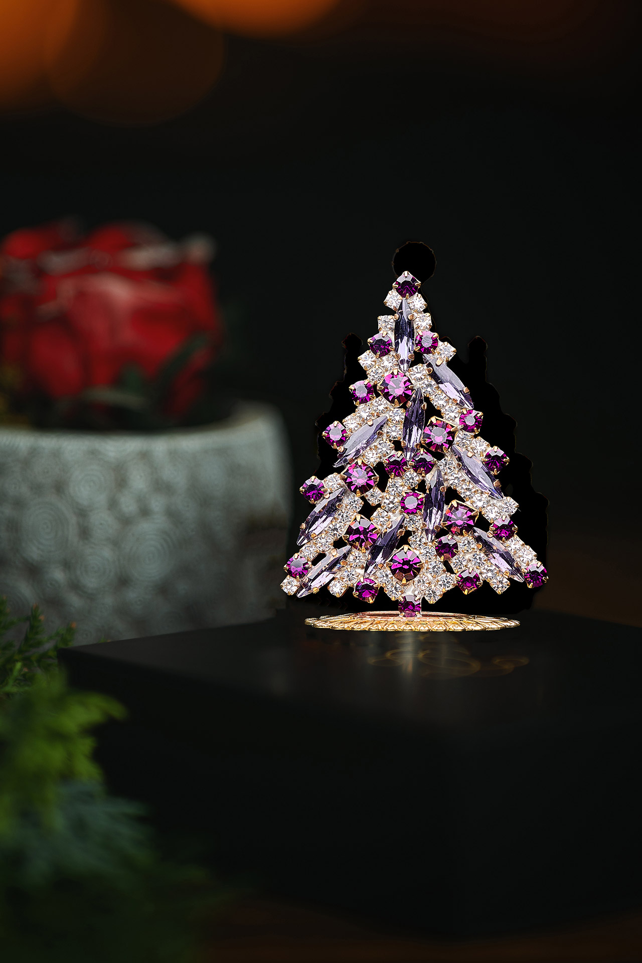 Magical tabletop Christmas tree handcrafted with purple rhinestones