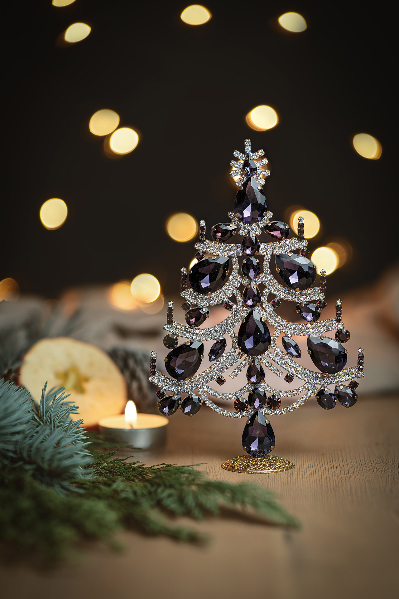 Charming Christmas tree handcrafted with purple rhinestones