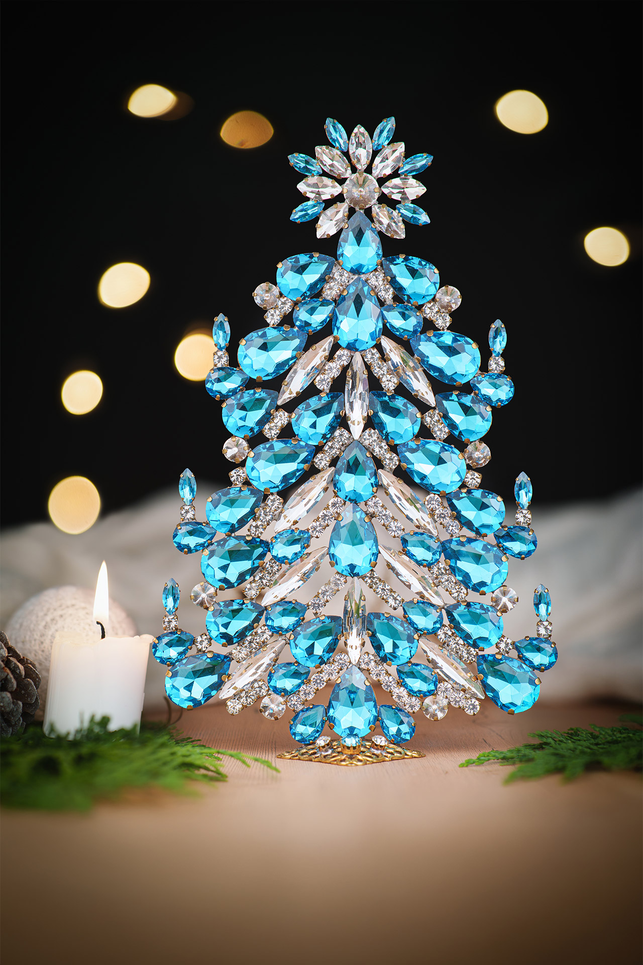 Festive tabletop Christmas tree with aqua rhinestones
