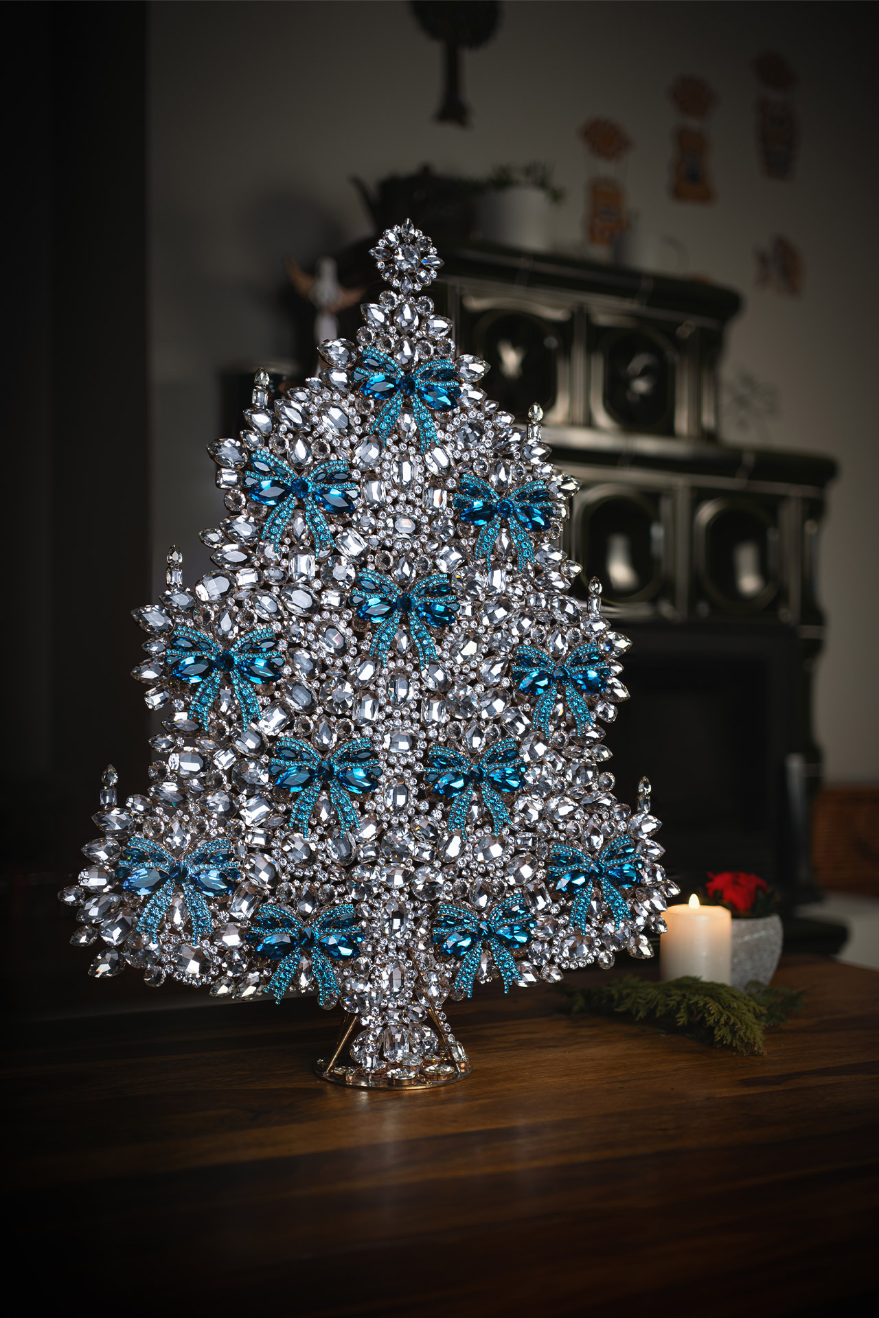 Christmas tree from clear rhinestones, adorned in stunning blue bows