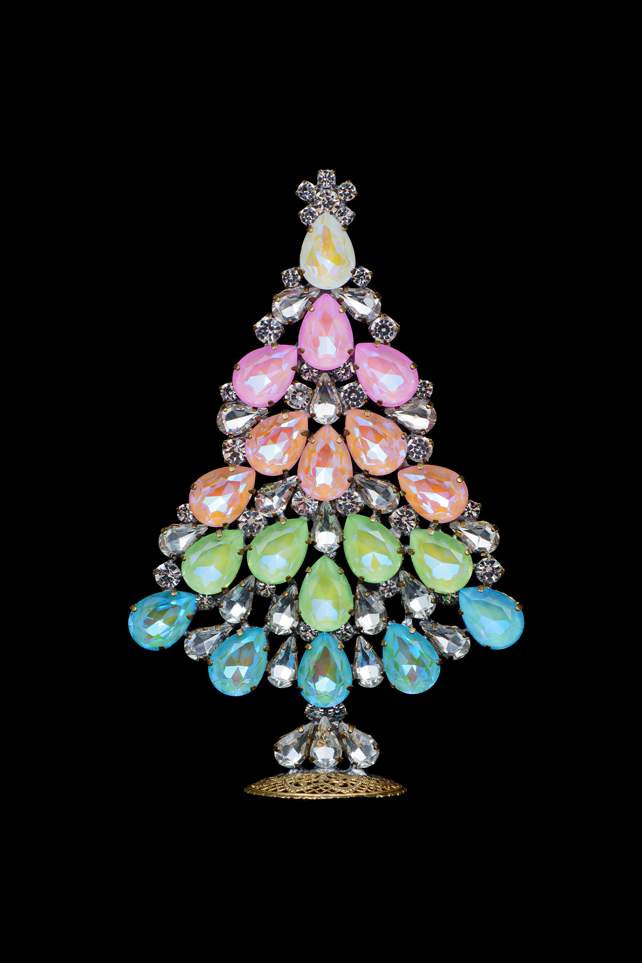 Christmas tree made of rhinestones and opal stones in rainbow color