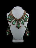 gold and peridot unique earrings and necklace absolue