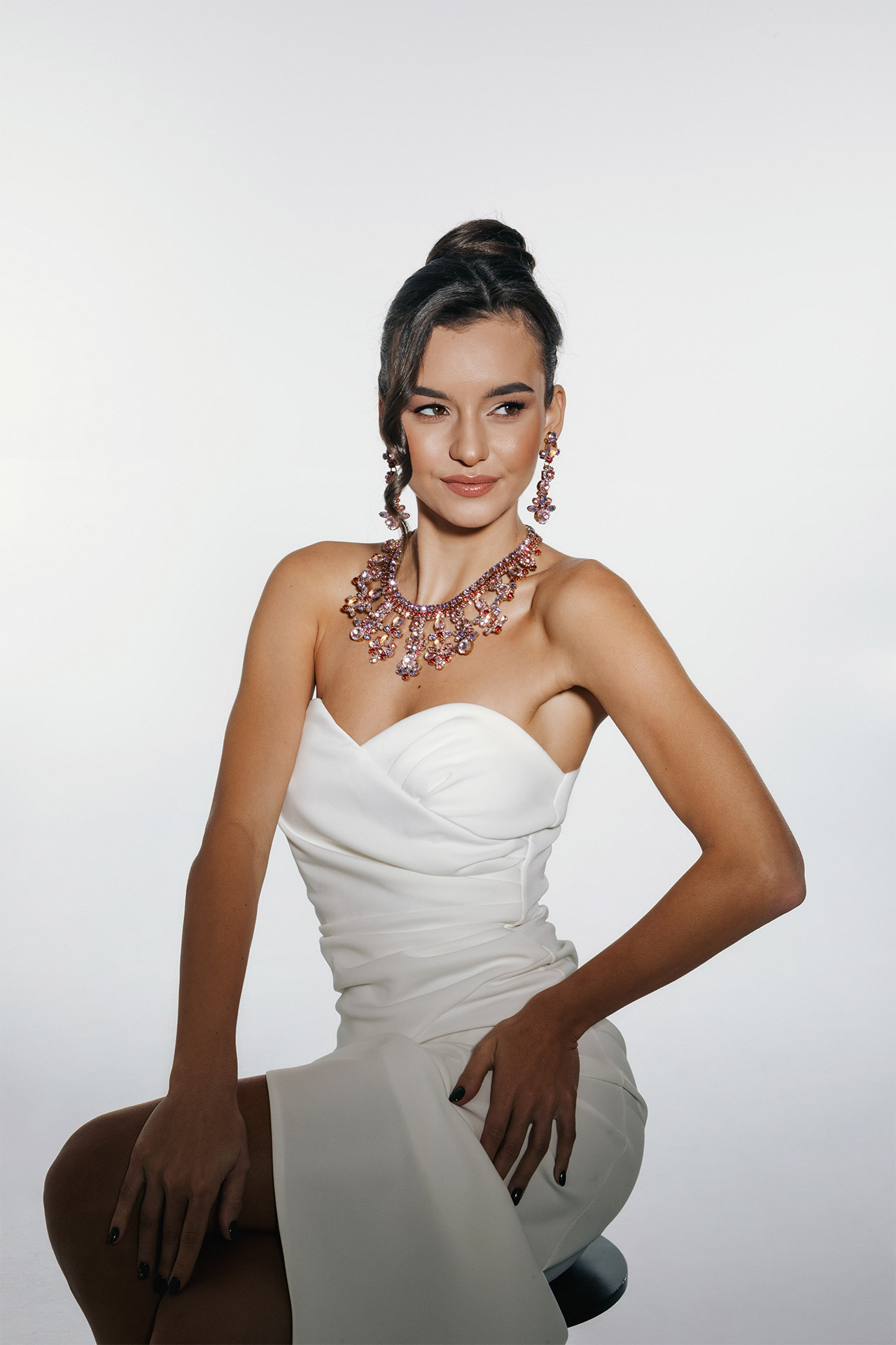 Rhinestone necklace and earrings with pink and violet crystals