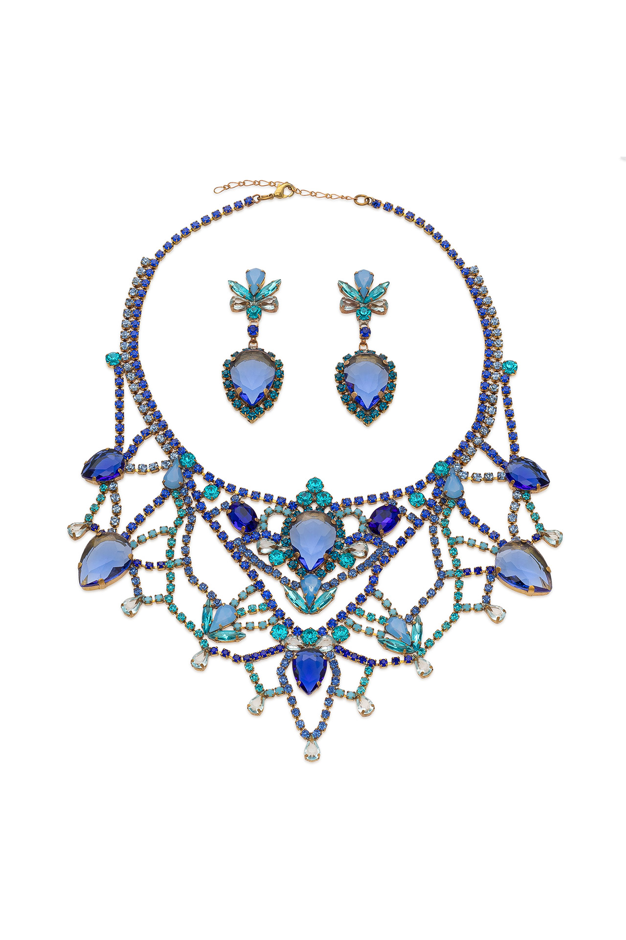 Blue rhinestone necklace and earrings in design like crystal lace