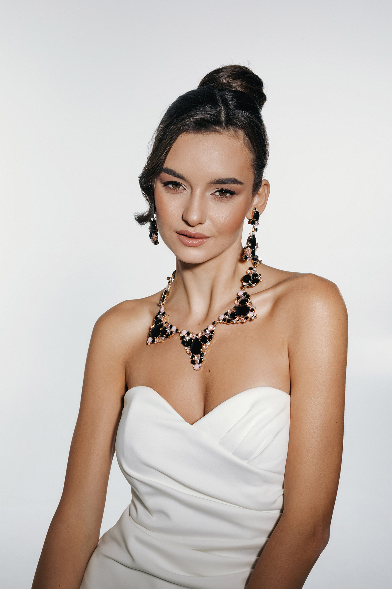 Rhinestone jewelry set with cascading black and pink crystals