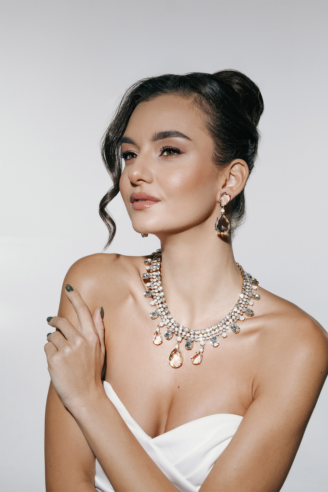 Necklace and earrings with teardrop and clear crystals, accented with white opal