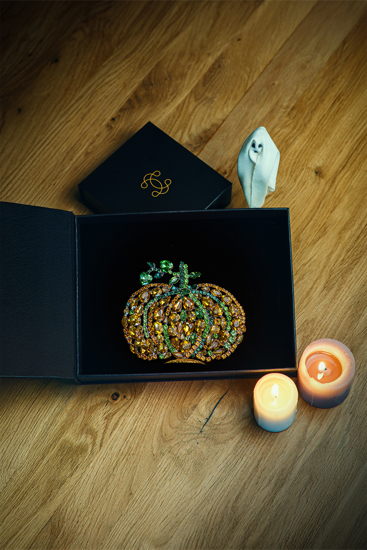Wide rhinestone pumpkin made of mixed-size gems, sparkling and elegant
