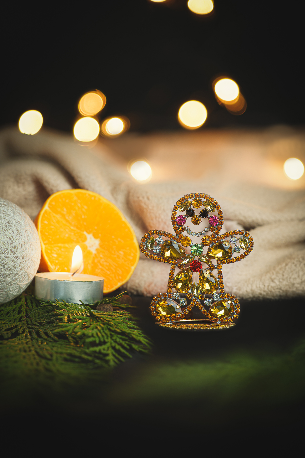 Handcrafted decorative gingerbread man made of colored rhinestones