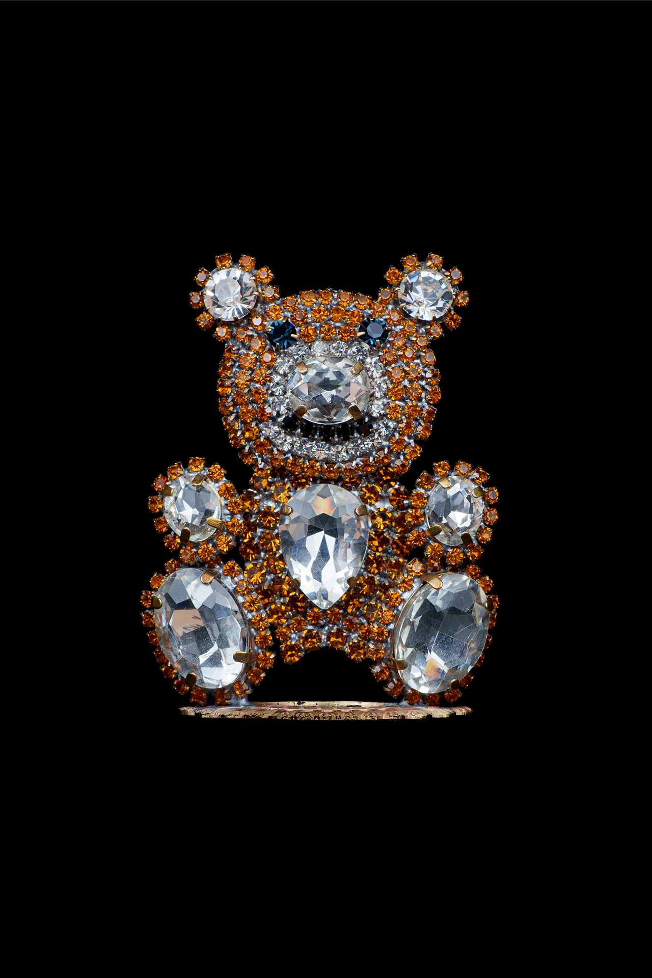 Rhinestone bear figurine made with brown and clear crystalsandcrafted decorative gingerbread man made of colored rhinestones