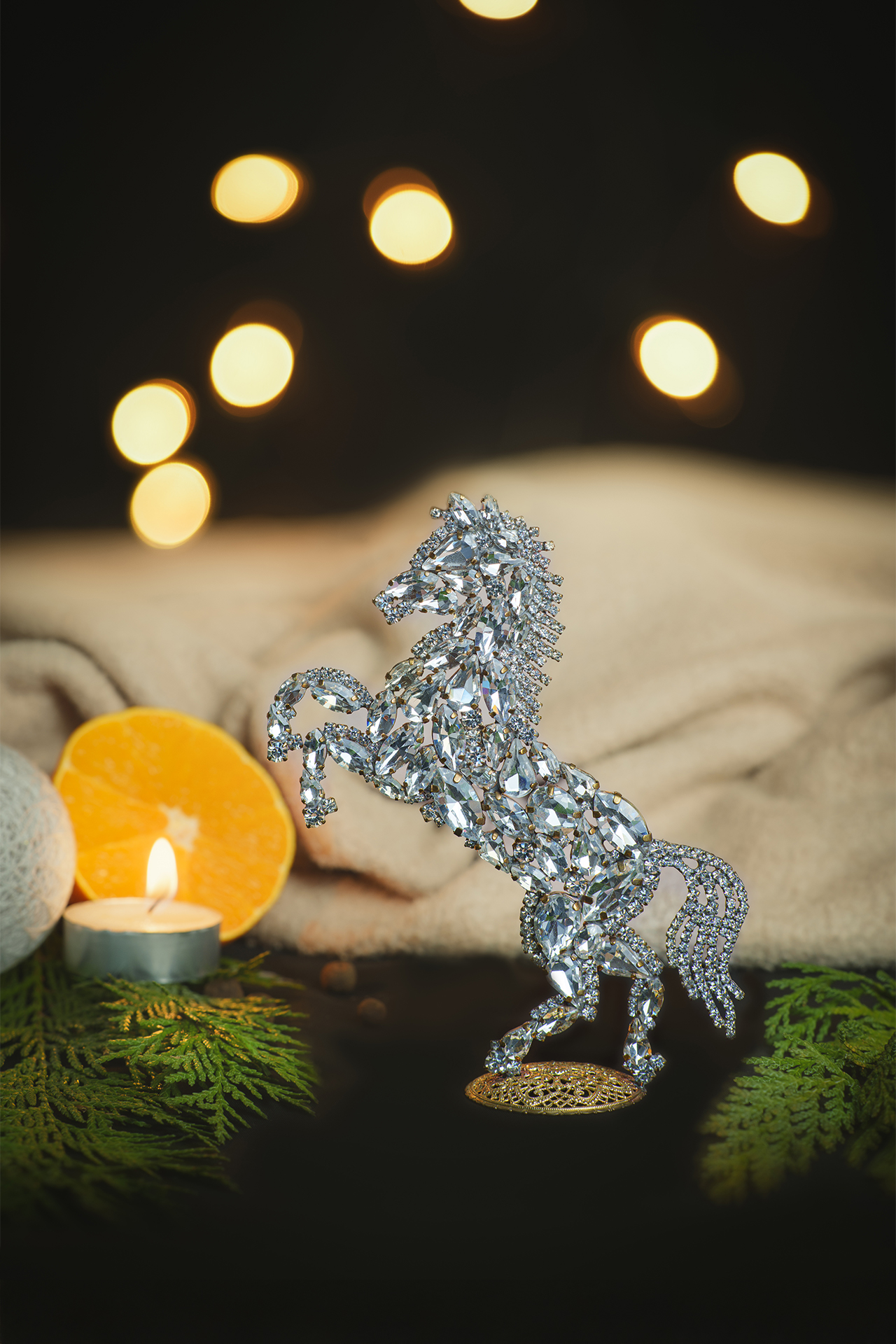 Bedazzled horse figurine made from clear rhinestones, facing to the left