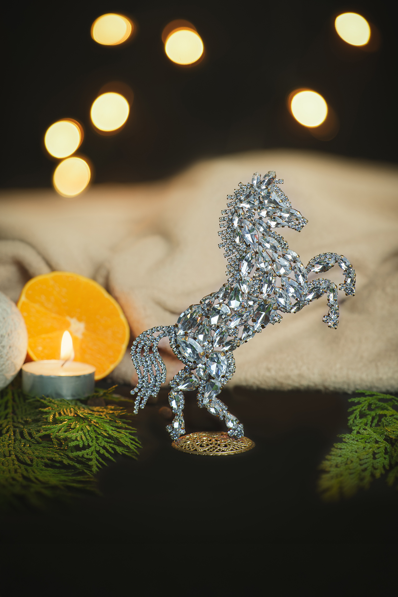 Bedazzled horse figurine made from clear rhinestones, facing to the right