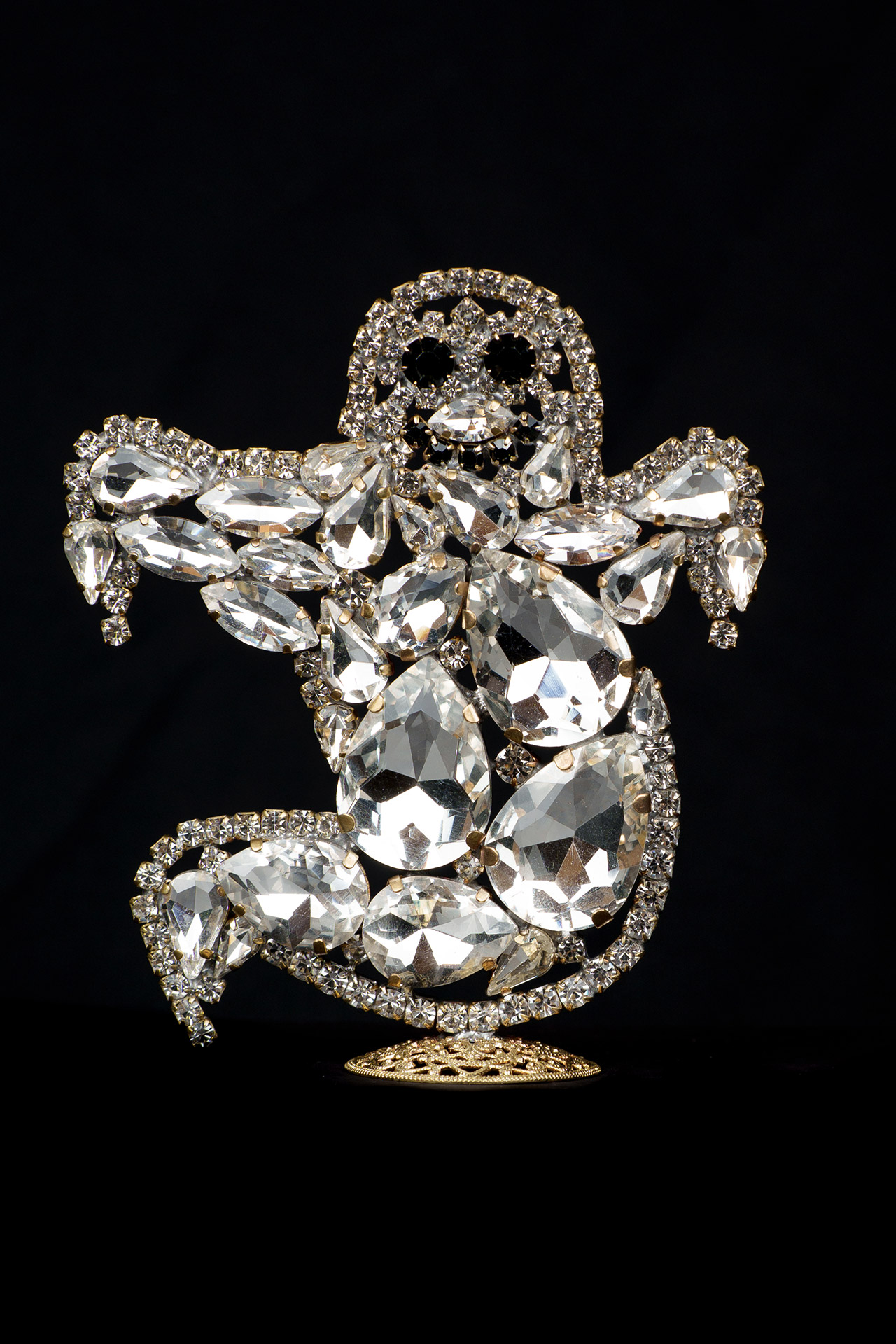 Left facing clear and black rhinestone ghost figurine