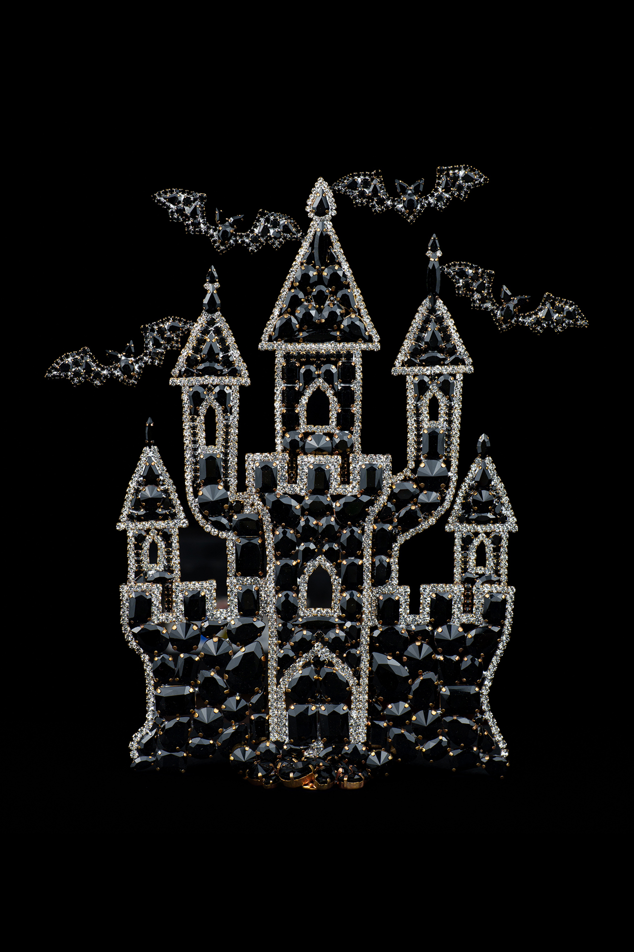 Large rhinestone haunted castle with dark crystal sparkle