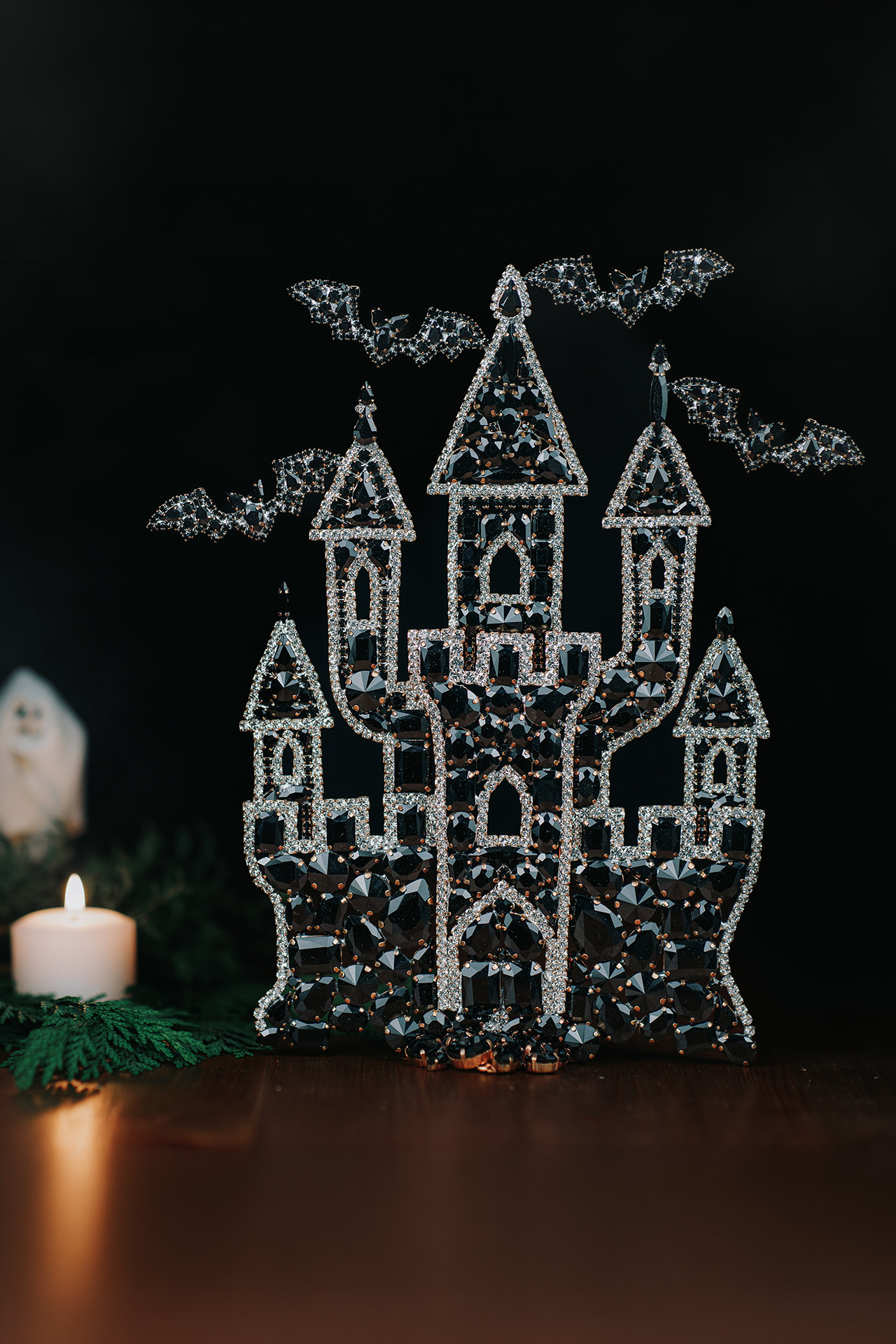 Large rhinestone haunted castle with dark crystal sparkle