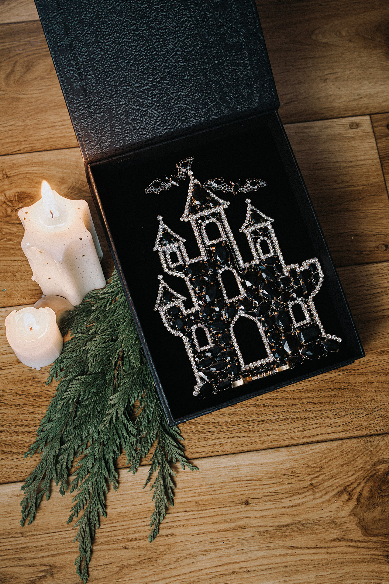 Large rhinestone haunted castle with dark crystal sparkle