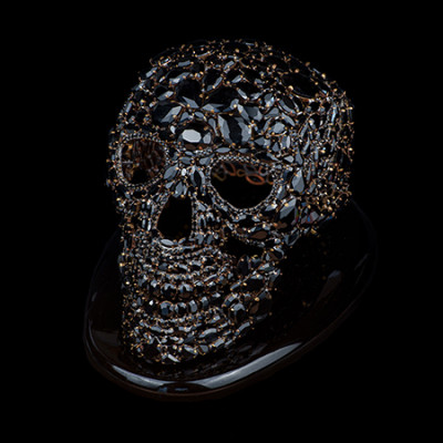 Black rhinestone skull with fine gemstone-inspired detailing.